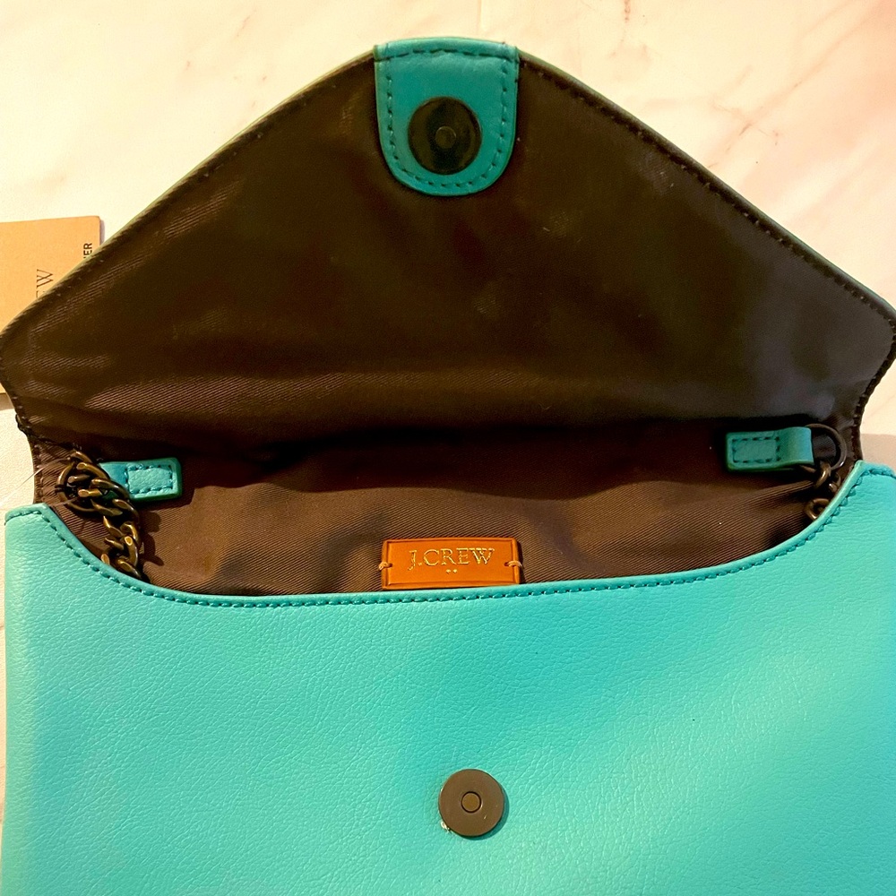 NWT turquoise leather clutch